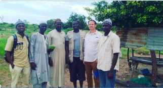 Neal Spackman with rice farmers in The Gambia co-designing agroforestry systems
